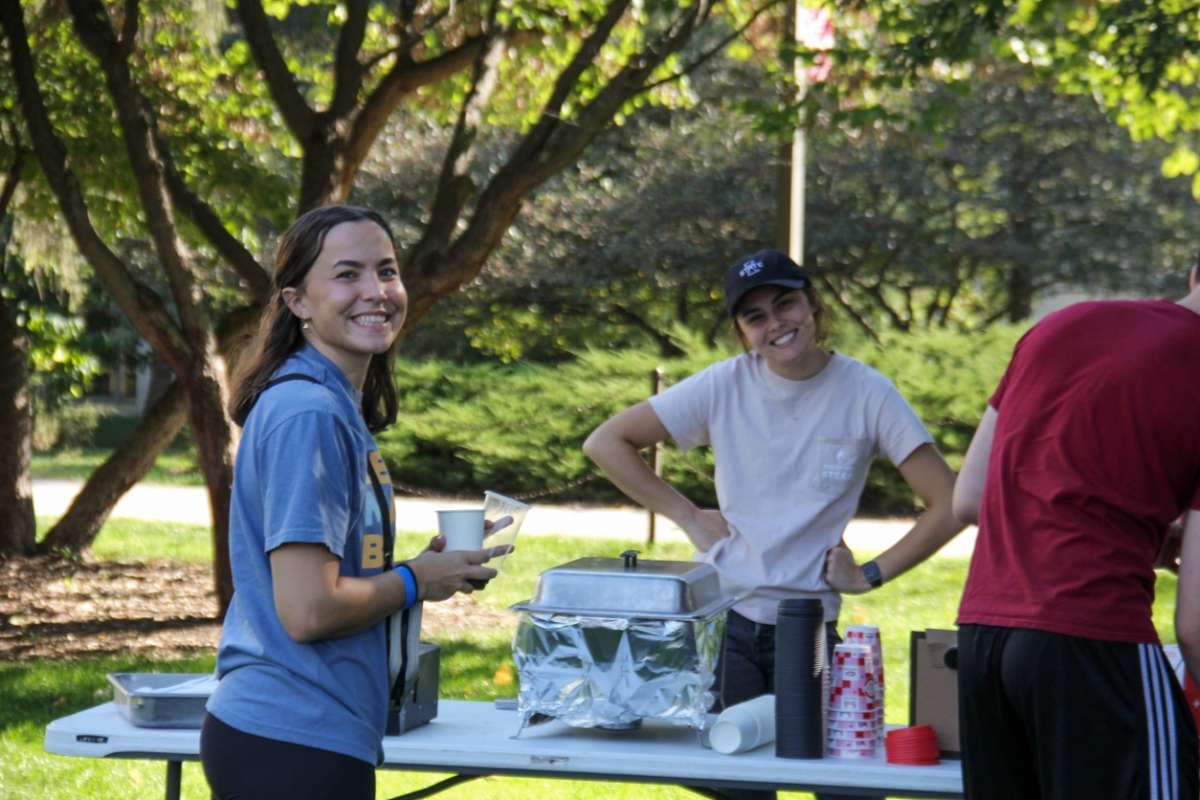 Dance Marathon members at sausage table at Stacks for Stead 2023